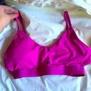 barley worn hot pink nike sports bra